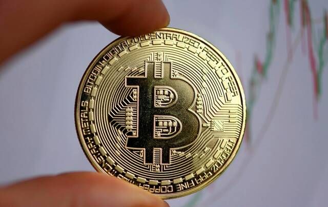 "بتكوين" أقل من 60 ألف دولار لأول مرة منذ شهر
