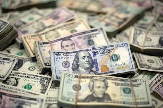 استقرار الدولار بعد ارتفاع حاد مع ترقب تصريحات مسؤولي الفيدرالي