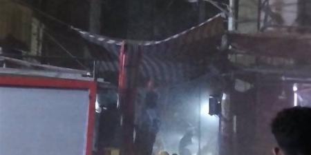 انتشال جثمان سيدة خمسينية من أسفل أنقاض عقار المنيا المنهار